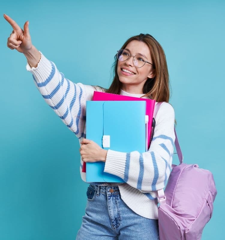 Student with folders and backpack